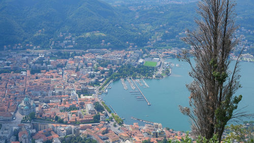 High angle view of townscape by sea