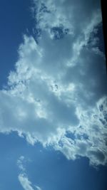 Low angle view of clouds in blue sky