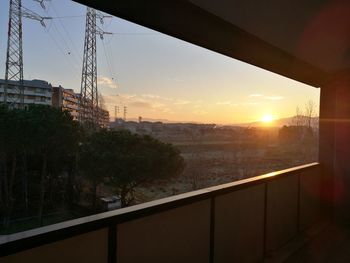 View of cityscape against sky during sunset