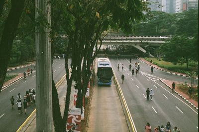 High angle view of vehicles on road in city