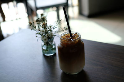 Close-up of iced coffee on table