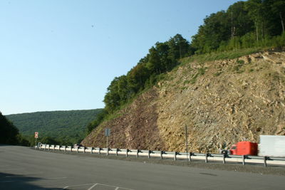 Empty road along mountain range