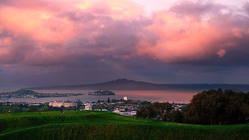 Scenic view of landscape against cloudy sky