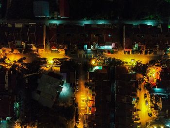 High angle view of illuminated buildings at night