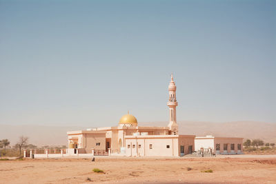 View of temple building against clear sky