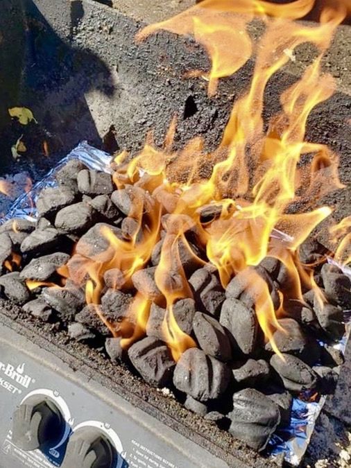 CLOSE-UP OF MEAT ON BARBECUE