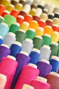 Full frame shot of colorful spools of thread