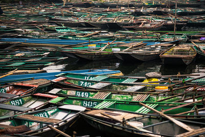 Boats moored at harbor