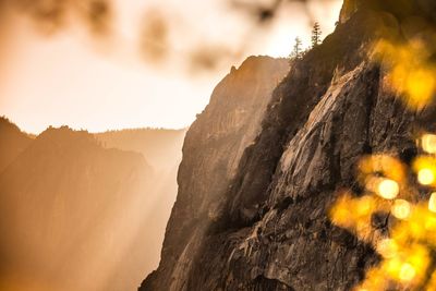 Scenic view of rock formation against sky during sunset