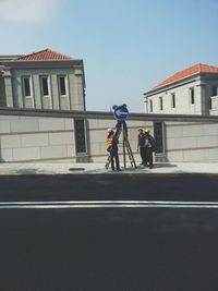 People standing in front of building