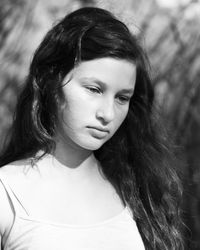 Beautiful young woman looking away