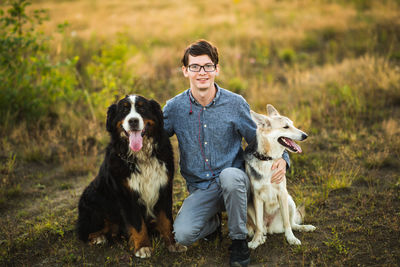 Portrait of dog sitting outdoors