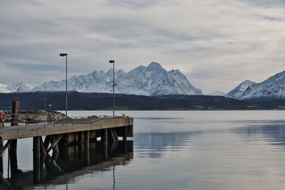 Breivikeidet fergekai, norway. breivikeidet ferry dock in norway. fjord and mountains.