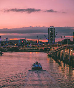 Scenic view of river against sky during sunset