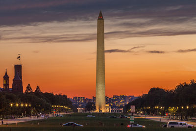 Low angle view of city at sunset