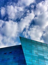 Low angle view of built structure against blue sky