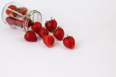 Close-up of raspberries against white background