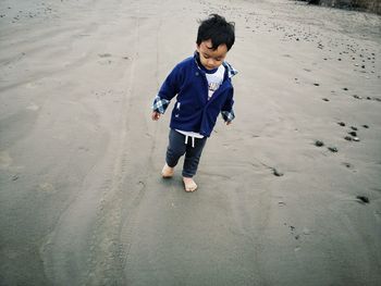 Portrait of boy on beach