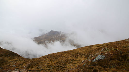 Scenic view of volcanic mountain against sky