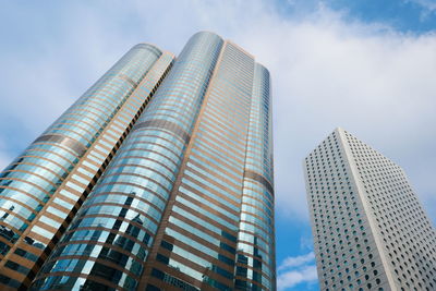 Low angle view of modern buildings against sky