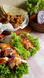 High angle view of chopped vegetables in bowl on table