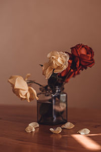 Close-up of roses on table