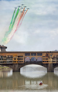 Italy, florence,  the city and freccie tricolori airplane.