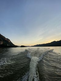 Scenic view of sea against sky during sunset