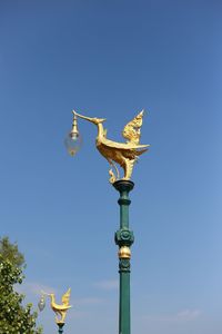 Low angle view of statue against clear sky