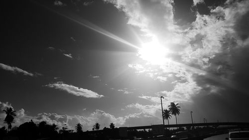 Low angle view of silhouette man against sky during sunset