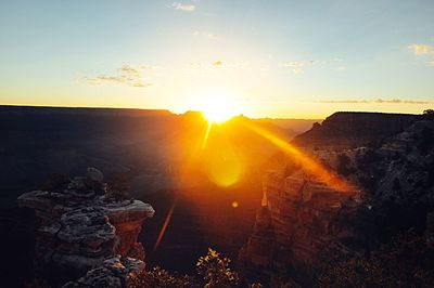 Sun shining over landscape