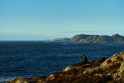 Scenic view of sea against clear sky