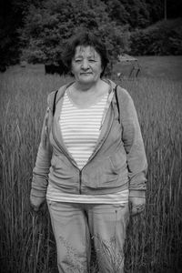 Woman standing on field