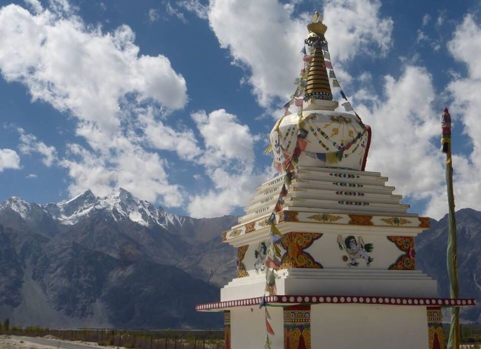 TRADITIONAL TEMPLE AGAINST CLOUDY SKY