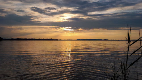 Scenic view of sea against sky during sunset