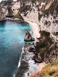 High angle view of water flowing through rocks