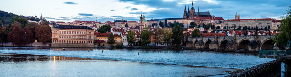 View of bridge over river in town