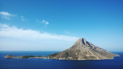 Scenic view of sea against blue sky