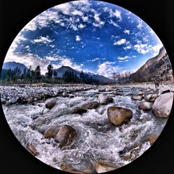 Scenic view of mountains against sky during winter