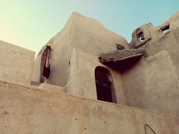 Low angle view of built structure against clear sky