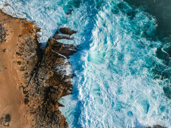 High angle view of waves in sea