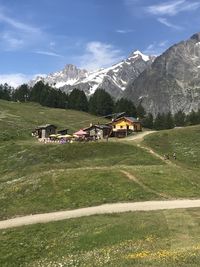 Scenic view of landscape and mountains against sky