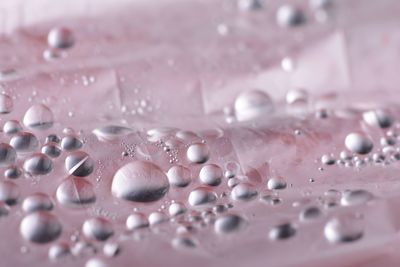 Close-up of water drops on plastic