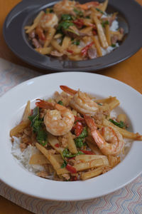 Close-up of pasta served in plate on table