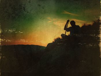 Silhouette people at sunset