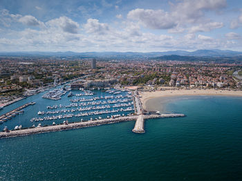 Panoramic view of rimini, its sea, its beaches and its port on the romagna riviera in post-pandemic 