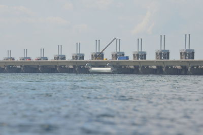 Pier over sea against sky
