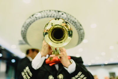 Man playing trumpet during event