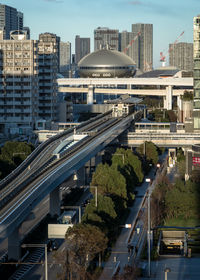 High angle view of bridge amidst buildings in city