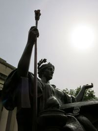 Low angle view of statue against clear sky
